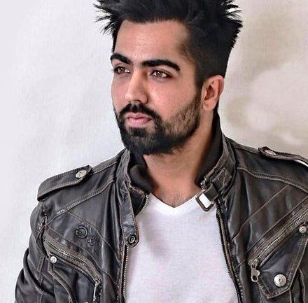 Harrdy Sandhu smiling