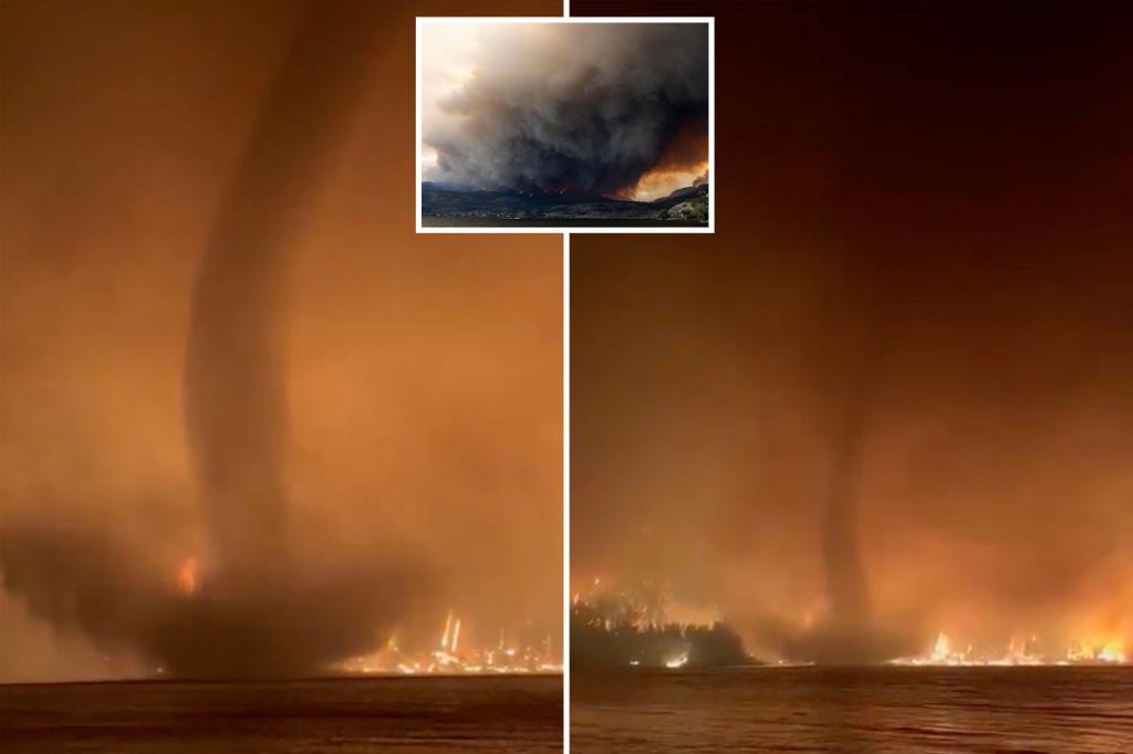 Watch dramatic video of waterspout spinning in front of massive Canadian wildfire