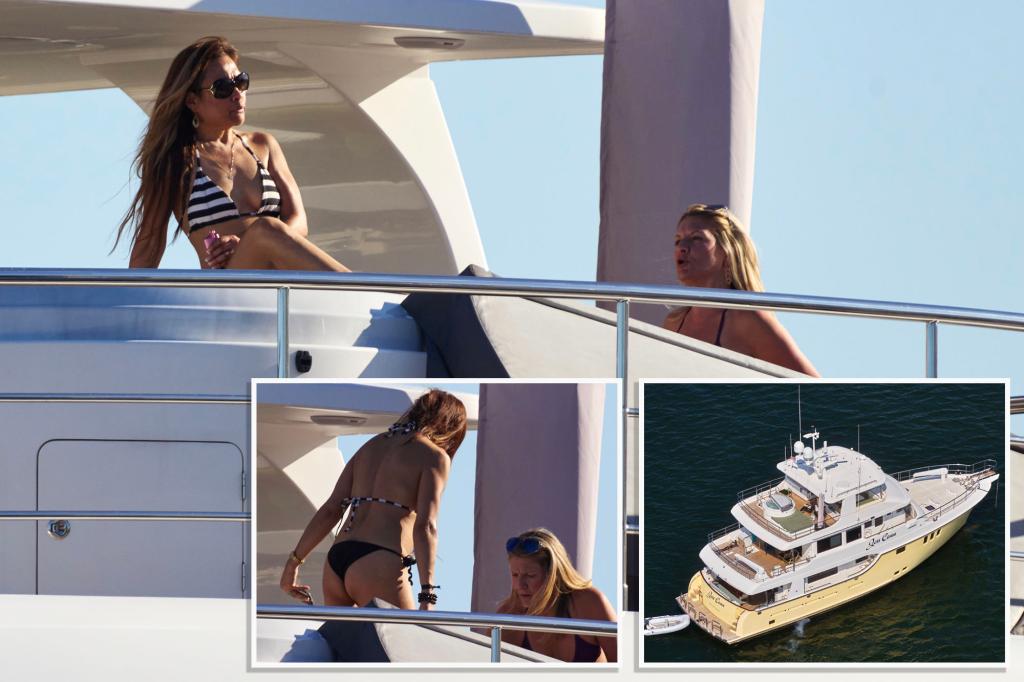 Bikini babes soak up the sun on busted doc’s Nantucket porn party yacht, now moored in Maryland