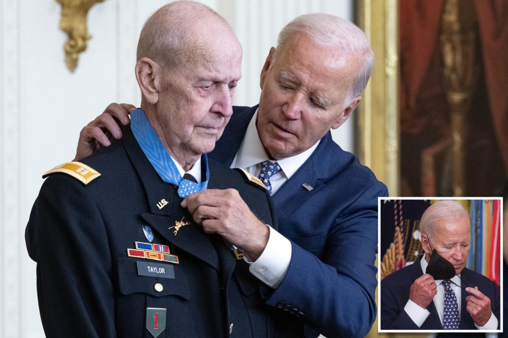 COVID-exposed Biden flouts White House mask rule as he stands just inches away from elderly Medal of Honor vet