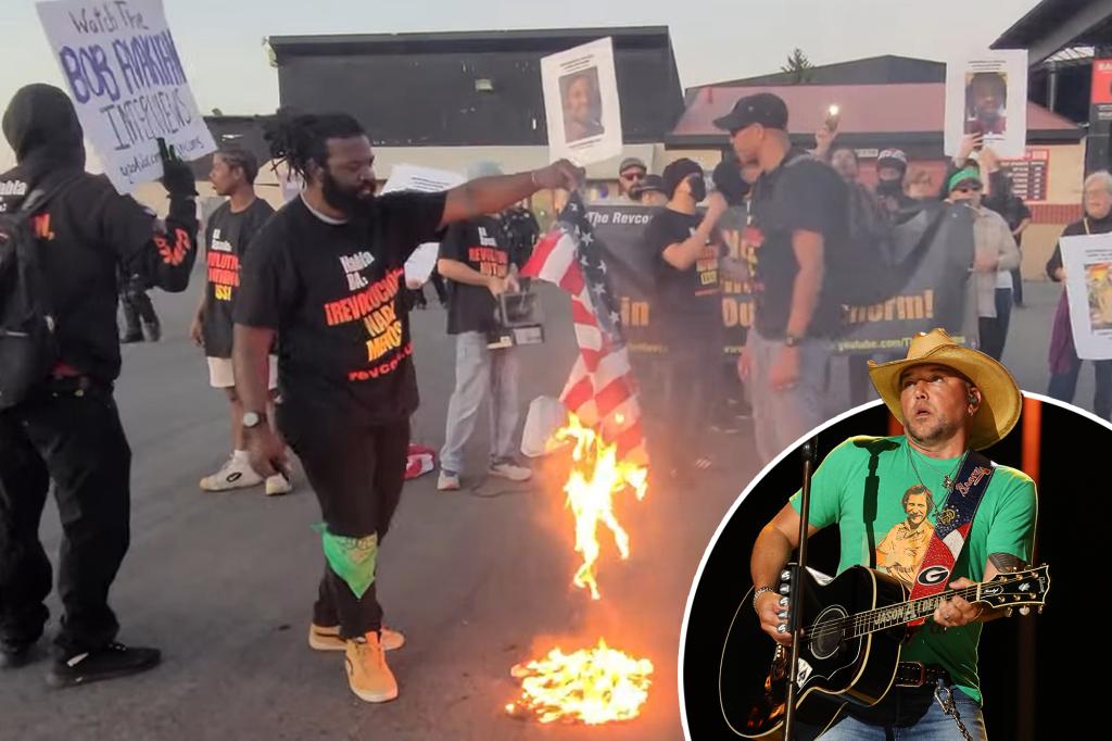Communist revolutionaries set fire to American flags in protest outside Jason Aldean show: ‘We will try it right in front of your concert’