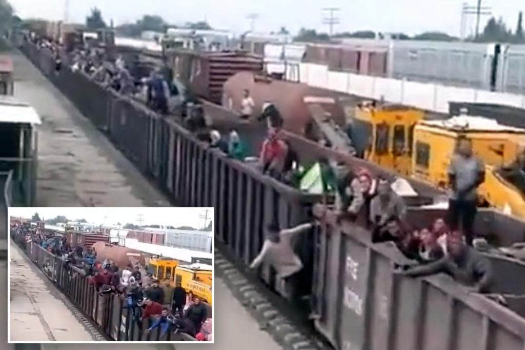 Migrants cheer as they pack into train heading to the US from Mexico: video