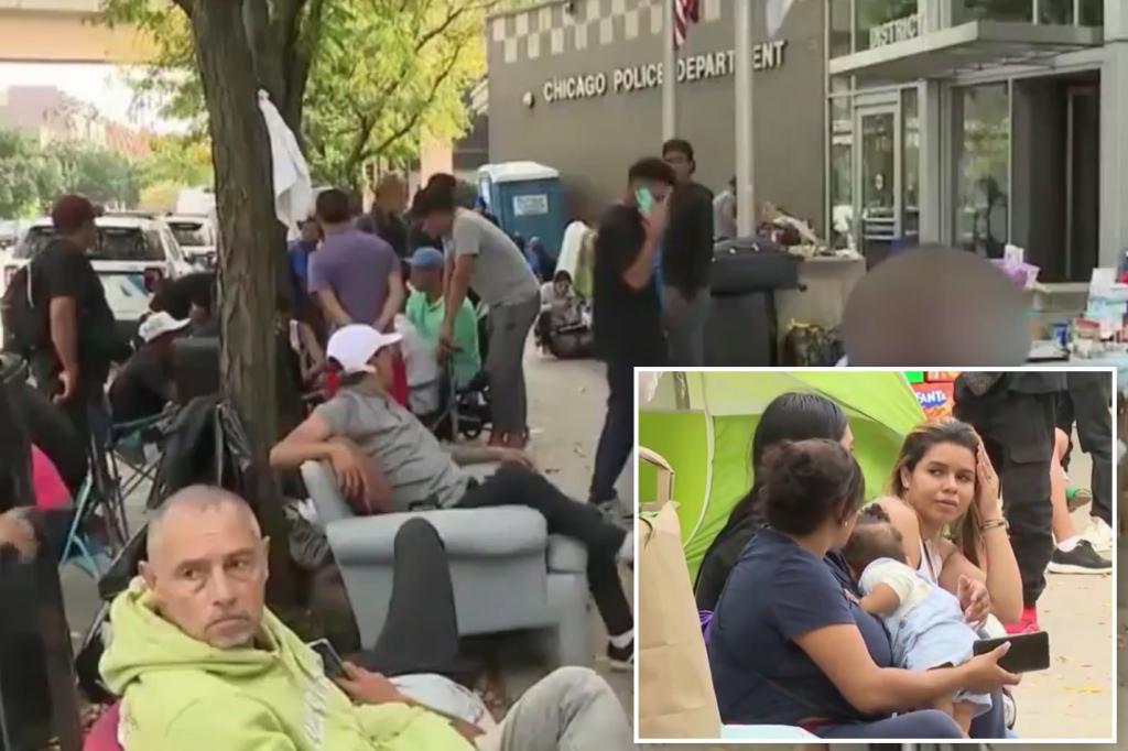 Chicago migrants crammed on sidewalk with belongings after being locked out of police station
