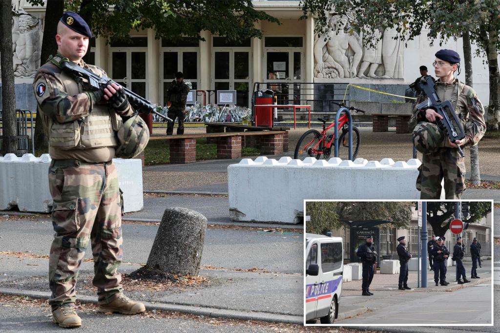 French high school where teacher was killed Friday evacuated over bomb alert