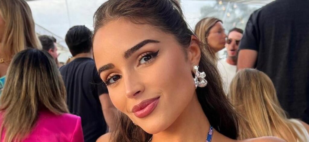 Olivia Culpo Enjoys Ice Cream In Plunging Sundress