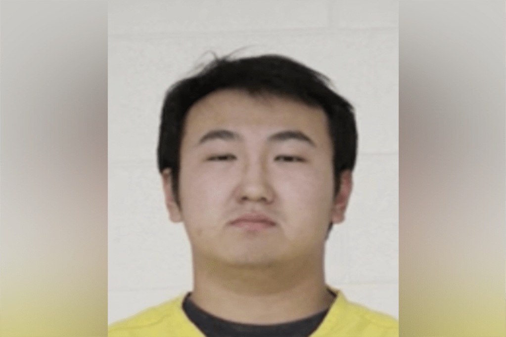 Xinyu Li, accused of recording women showering in a dorm, is charged with two counts of criminal trespassing and two counts of invasion of privacy by viewing or photographing a person without consent.