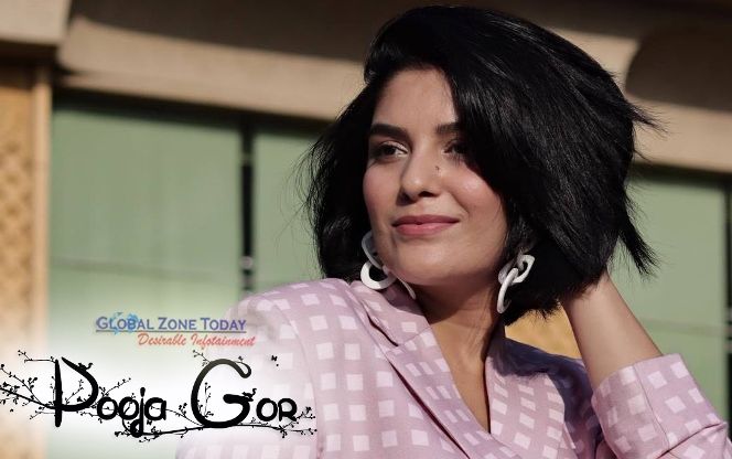 Actress Pooja Gor playing with hairs in pink outfit