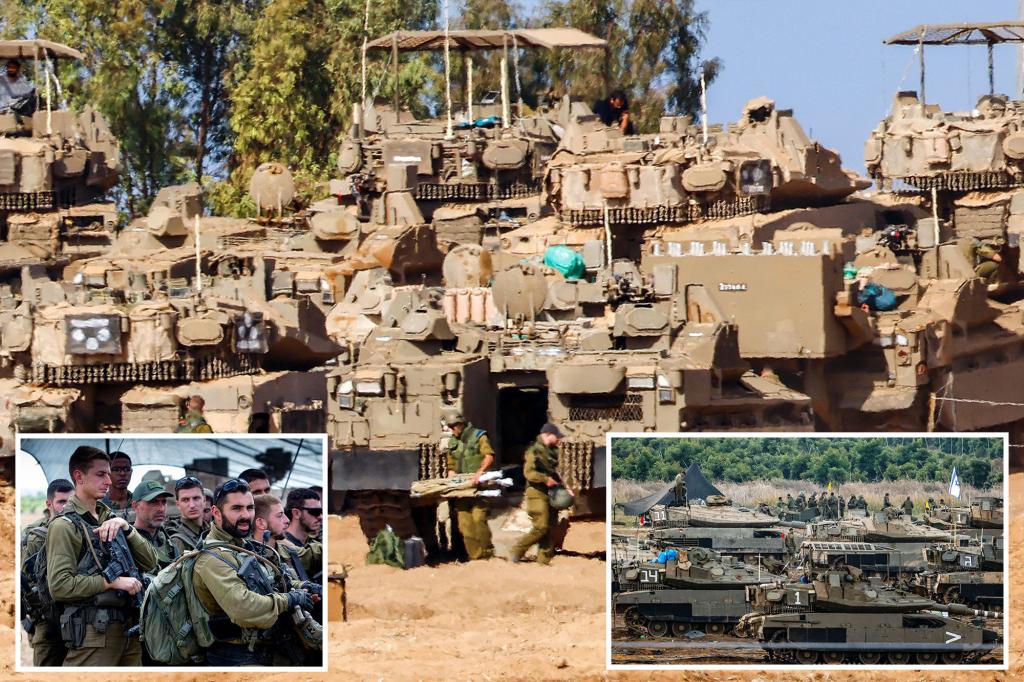 Tanks line up at Gaza border as ground invasion appears imminent