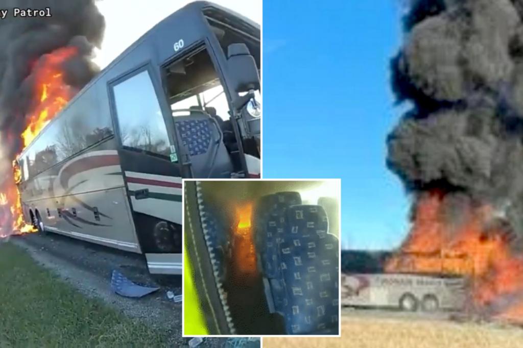 Moment heroic cop runs into bus engulfed in flames to rescue students on board: video