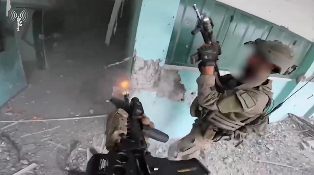 Hamas ‘beginning to break’ as tense video shows IDF facing off with terrorists in ruins of Gaza City school