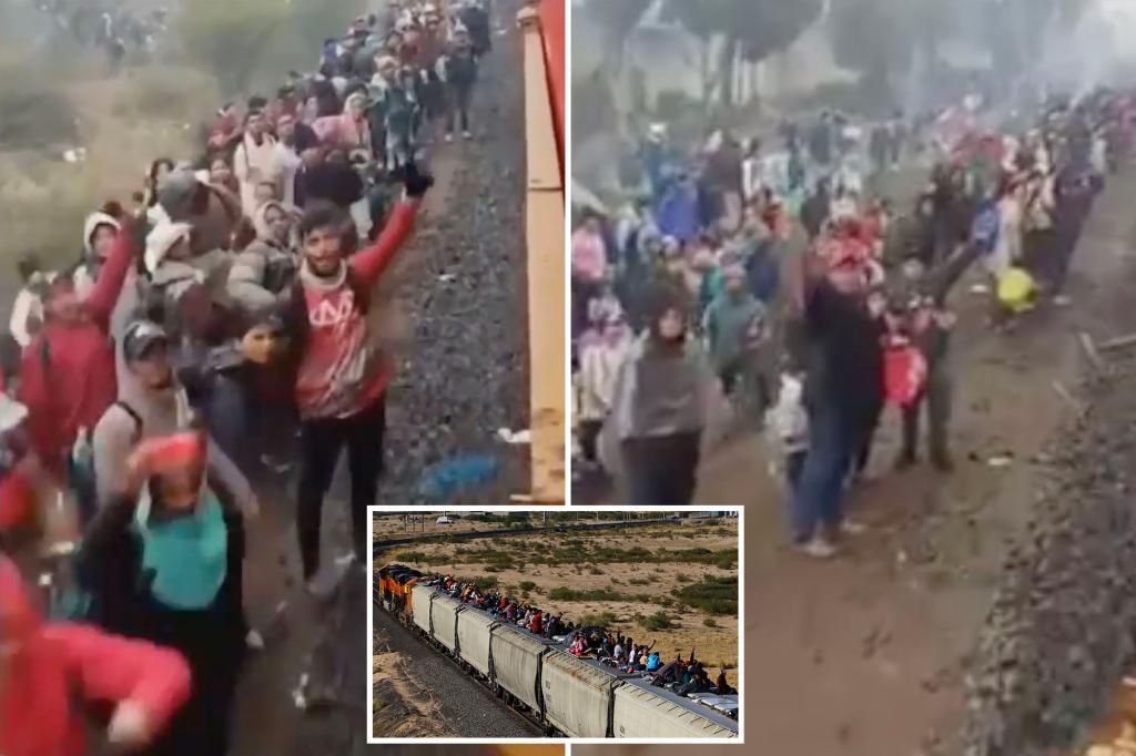Huge line of thousands of migrants spotted trying to hop train to US border