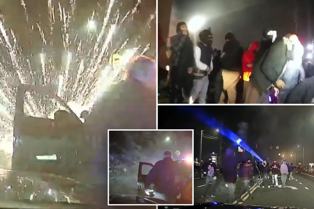 Moment unruly crowd sets off fireworks, attacks cops during Connecticut street takeover