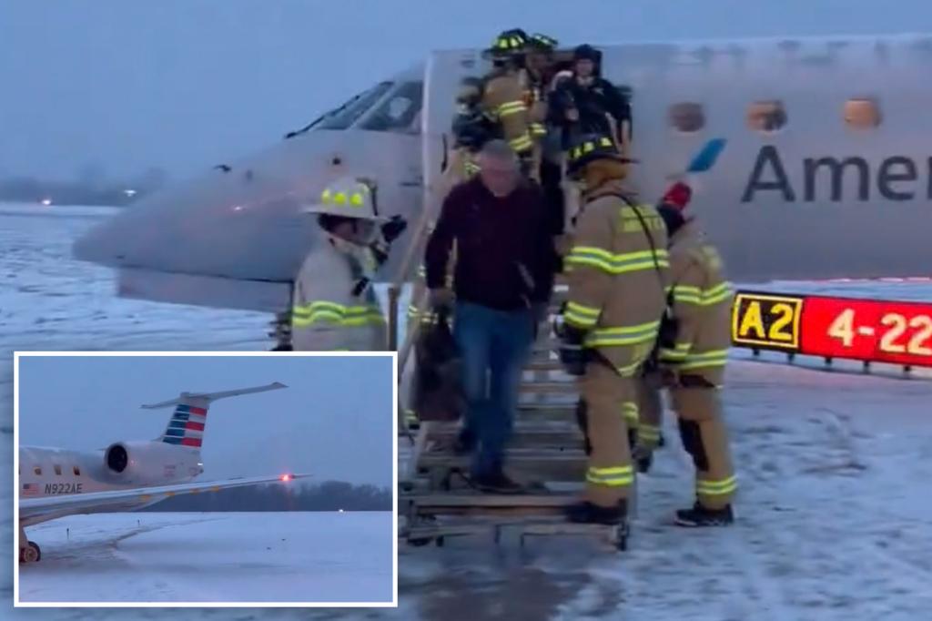 American Airlines plane carrying 53 passengers slips off ‘snowy’ NY runway after landing hour behind schedule