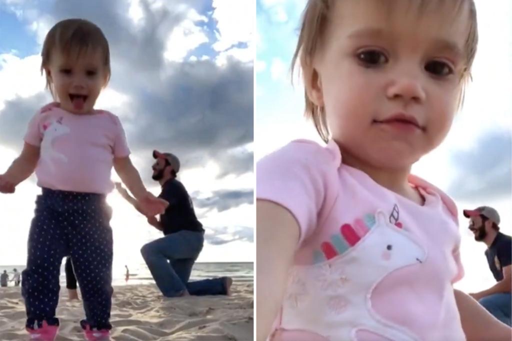 Couple’s young daughter hilariously photobombs their proposal video