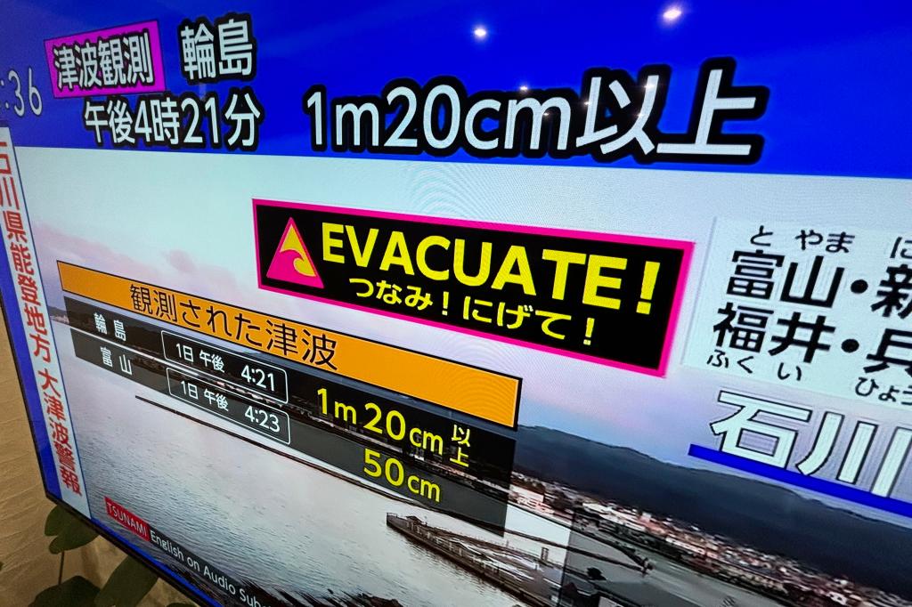 Japan issues tsunami warnings after series of powerful earthquakes, residents urged to flee to high land