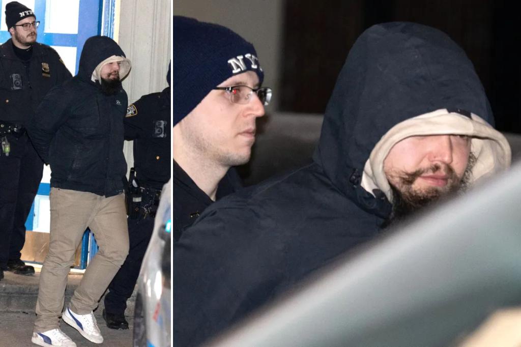 Taylor Swift’s alleged stalker attempts to hide his face as he’s led out police station in handcuffs after charges