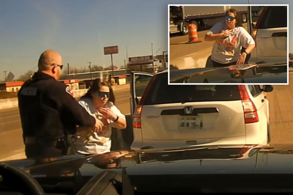 Cop performs Heimlich maneuver on motorist choking on piece of gum in the middle of highway: video