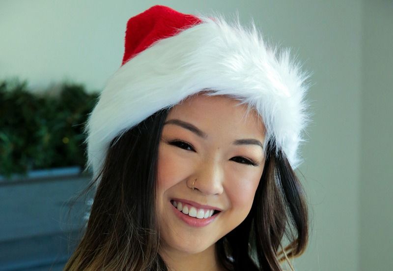 Lulu Chu wearing a Christmas hat