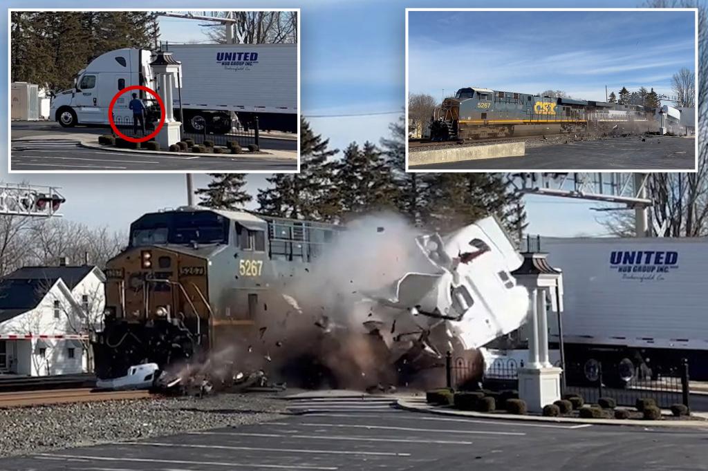 Oblivious driver stands feet away from tracks as speeding train plows through his truck