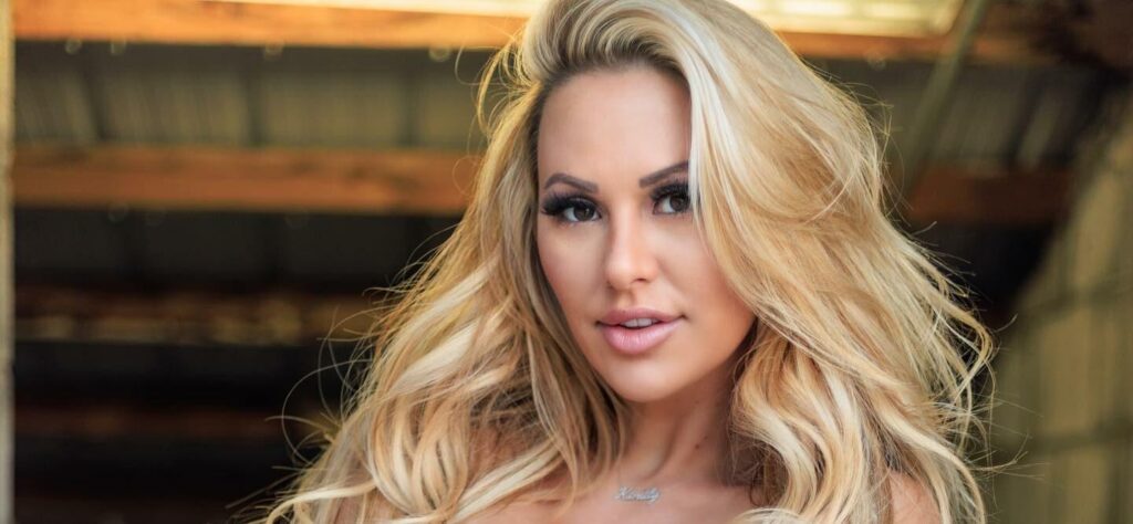 Kindly Myers Gives 'Vibes' In A Tank Top And Tiny White Thong